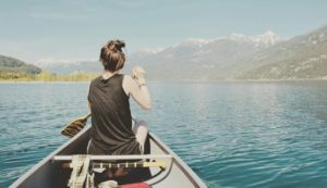 Girl in a canoe on Kootenay Lake